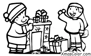 Navidad / Moda de Navidad: Un niño poniéndose una gorra de Papá Noel